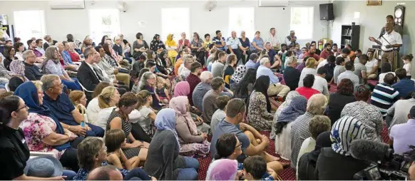  ?? Photo: Kevin Farmer ?? AS ONE: Professor Shahjahan Khan addresses a cross-section of the Toowoomba community, gathered on Saturday afternoon at the Garden City Mosque to show solidarity for the victims of the Christchur­ch terror attacks.