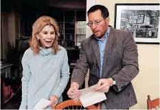  ?? ?? CELIA Straus shows her collection of letters and photos from her parents, Raymond and Patricia Brim, to historian Andrew Carroll of the Center for American War Letters.