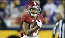  ?? MATTHEW HINTON — THE ASSOCIATED PRESS ?? Alabama wide receiver DeVonta Smith won the Heisman Trophy on Tuesday night.