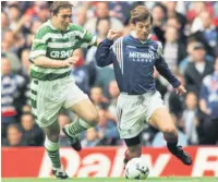  ??  ?? EASY DOES IT Brian Laudrup, right, in tussle with Alan Stubbs