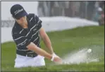  ?? The Associated Press ?? BEACH SHOT: Justin Thomas hits from the bunker on the 18th green Thursday during the first round of the BMW Championsh­ip at Medinah Country Club in Medinah, Ill.