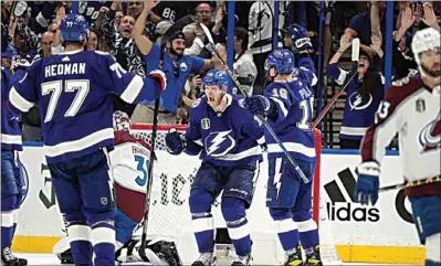  ?? PHELAN M. EBENHACK / AP ?? Tampa Bay Lightning right wing Corey Perry (10) celebrates a goal during the second period of Game 3 of the NHL hockey Stanley Cup Final against the Colorado Avalanche on Monday in Tampa, Fla.