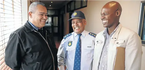  ?? Picture: Esa Alexander ?? The investigat­ing officer, Capt Craig Phillips, left, Western Cape acting provincial police commission­er Lt-Gen Sindile Mfazi, centre, and Const Goodwill Nkonki, who cracked the Uyinene Mrwetyana murder case.