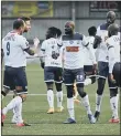  ?? Picture by Neil Marshall ?? LEVELLER Bedsente Gomis, middle, has just equalised for Hawks against Eastbourne Borough