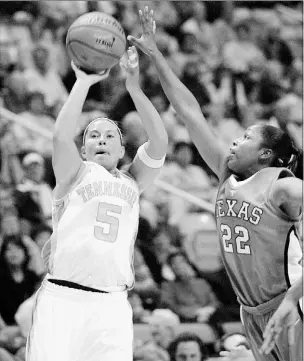  ??  ?? Shanna Zolman, who scored 23 points, shoots over Nina Norman during Tennessee’s 102-61 rout.