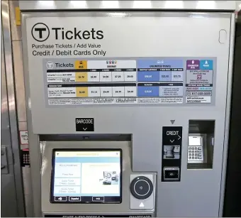  ?? STUART CAHILL / HERALD STAFF ?? SHINY NEW TOYS: The newer Charlie Card machines at the Red Line Charles/MGH station on Wednesday. The machine overhaul project is $211 million over budget and three years behind schedule, according to a Pioneer Institute report.