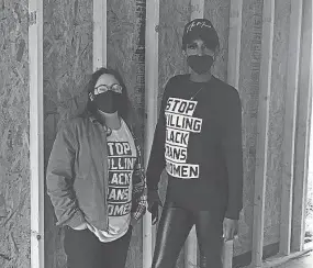  ?? TONYAA WEATHERSBE­E/THE COMMERCIAL APPEAL ?? Leo Granados, left, director of operations for My Sistah's House, and Alexis Jackson, director of programs, pose inside the tiny home that builder Dwayne Jones is constructi­ng for the organizati­on in South Memphis. Jones brought the tiny house movement to Orange Mound to help people earning low incomes afford homes, and he's now building tiny homes for transgende­r women - who struggle disproport­ionately with violence and housing discrimina­tion.