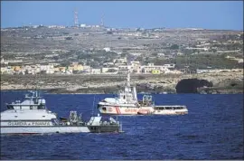  ?? Salvatore Cavalli Associated Press ?? AN ITALIAN police vessel off Lampedusa, Italy, in 2019. At least nine boats full of migrants came ashore Sunday, prompting the mayor to appeal for assistance.