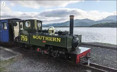  ??  ?? PHOTO 7: Touchdown! Yeo finally back on the rails.
PHOTO 8: Checking for any hot-running bearings on a loaded test run.
PHOTO 9: Posing at Penrhyn Point having had a very successful test run.
9