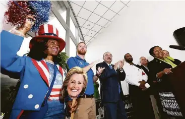  ?? Yi-Chen Lee photos / Houston Chronicle ?? At the grand opening of the Democratic headquarte­rs in downtown Houston, U.S. Rep. Sheila Jackson Lee, far right, called Hillary Clinton someone who “applauds diversity.”