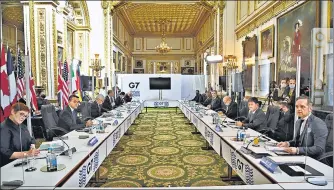  ?? AP ?? G7 foreign ministers are seated before the start of a meeting in London on Wednesday.