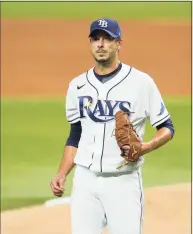  ?? Cooper Neill / MLB Photos via Getty Images ?? Former Rays pitcher and state native Charlie Morton signed a one-year, $15 million deal with the Braves on Tuesday.