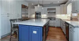  ?? Photo courtesy of Remodelers of Houston ?? This remodeled kitchen is part of whole-house award-winning project.