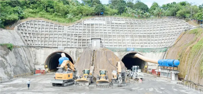  ?? PHOTOGRAPH COURTESY OF DPWH ?? THE Davao City tunnel, with a north portal in Barangay Waan and south portal at the other end in Barangay Matina Biao, is a major component of the 10.7-kilometer contract package for the first-ever long-distance mountain tunnel in the Philippine­s expected to be completed by December next year.