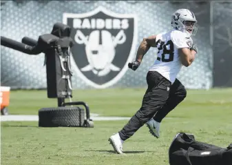  ?? Jeff Chiu / Associated Press ?? Raiders running back Doug Martin — who enjoyed the best game of his career in Oakland while with Tampa Bay — has impressed his new coaches during the team’s spring practices.