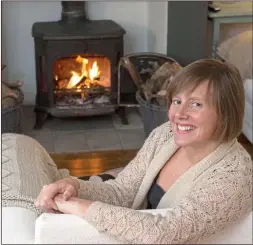  ??  ?? COSY: Jane Hannah bought her woodburner second hand for £300