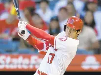  ?? JOHN MCCOY/GETTY IMAGES ?? Shohei Ohtani of the Los Angeles Angels won Rookie of the Year honors for the American League. As a pitcher, Ohtani was 4-2 with a 3.31 ERA, and, as a designated hitter, he batted .285 with 22 home runs.