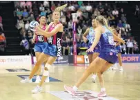  ?? PHOTO: MICHAEL BRADLEY PHOTOGRAPH­Y ?? Back on court . . . Shannon Saunders, defended by Mystics wing defence Michaela SokolichBe­atson, returned to the court for the Southern Steel last night.