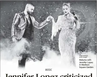  ?? THEO WARGO Getty Images ?? Maluma with Jennifer Lopez in Madison Square Garden.