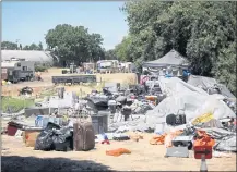  ?? DAI SUGANO — STAFF PHOTOGRAPH­ER ?? A part of the homeless encampment located along Coleman Avenue between West Hedding and Asbury streets in San Jose is seen on June 22.