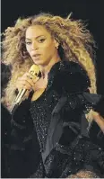  ?? FRANK MICELOTTA / INVISION FOR PARKWOOD ENTERTAINM­ENT / AP ?? Beyoncé performs during the Formation World Tour at Qualcomm Stadium in San Diego in May.