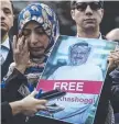  ?? VANISHED: Tawakkol Karman holds a picture of missing writer Jamal Khashoggi. ??