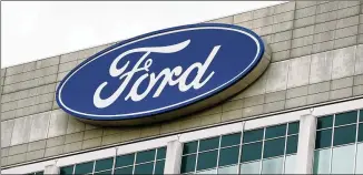  ?? BLOOMBERG 2017 ?? Ford Motor Co., whose headquarte­rs are in Dearborn, Michigan, finished 2020 with about 186,000 employees. It will let more than 30,000 use the office only when they need to, even after the pandemic ends.