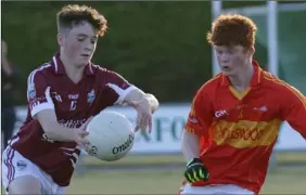  ??  ?? Adam Feery of St. Martin’s is watched all the way by Horeswood’s Dean Roberts.