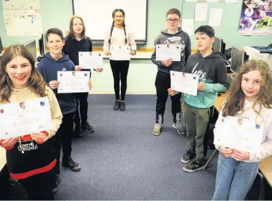  ??  ?? Does compute Pupils from Perth High show off their certificat­es