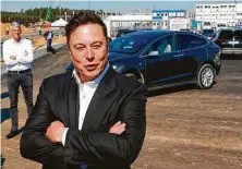  ?? Odd Andersen / AFP via Getty Images ?? CEO Elon Musk visits the site in September of the future Tesla plant in Gruenheide, Germany, near Berlin.