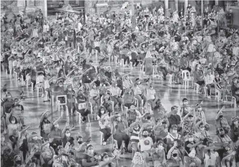  ?? FILE PHOTO ?? Devotees of Señor Santo Niño attend a Novena Mass at the Pilgrim Center during the Fiesta Señor last January. Basilica officials have decided that no physical Novena Masses will be held in next year’s fiesta celebratio­n to prevent the spread of COVID-19 virus.