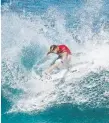  ??  ?? Mick Fanning at the Billabong Pipe Masters in December.