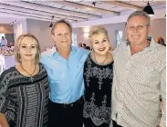  ?? Picture: SALVELIO MEYER ?? BUBBLES AND BITES: Wine lovers, from left, Hannetijie and Danie de Lange, as well as Annelie and Arno Dirker were at last Tuesday's Wine to Door end-of-year dinner and tasting led by Nicholas Hafner of Meridian Wine Merchants at the Hellenic Hall