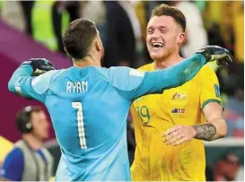  ?? — reuters ?? Unbelievab­le: australia’s Harry Souttar celebratin­g with mathew ryan after qualifying for the knockout stages.