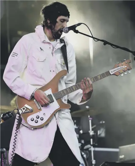  ??  ?? 0 Kasabian perform at TRNSMT – a more civilised affair than is typical of the booze-fuelled Glasgow music scene