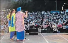  ?? SCREEN GRAB SPECIAL TO THE NIAGARA FALLS REVIEW ?? Bollywood and Bhangra singers perform into the night Sunday for the fifth annual iMela Festival at Queen Victoria Park.