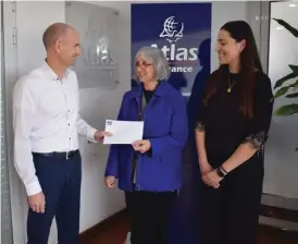  ?? ?? Atlas Insurance CEO Matthew von Brockdorff; SOS Malta founder member and Board administra­tor Claudia Taylor East and Atlas Insurance HR business partner Daniela Mariani