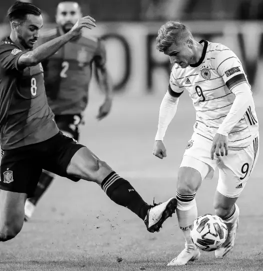  ?? AP ?? Germany’s Timo Werner (right) and Spain’s Fabian Ruiz battle for the ball during their UEFA Nations League football match at the Mercedes-Benz Arena stadium in Stuttgart, Germany, yesterday. The game ended in a 1-1 draw.