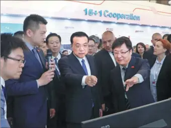  ?? LIU WEIBING / XINHUA ?? Premier Li Keqiang visits an exhibition of cooperatio­n between China and the 16 Central and Eastern European countries on Saturday in Sofia, Bulgaria, where the eighth China-CEEC Economic and Trade Forum was held.