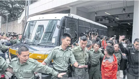  ??  ?? A prison van transporti­ng Donald Tsang, Hong Kong’s former chief executive, leaves the High Court in Hong Kong yesterday.