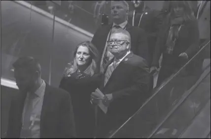  ?? CP PHOTO ?? Public Safety Minister Ralph Goodale and Foreign Affairs in Toronto. Minister Chrystia Freeland make their way to a press briefing