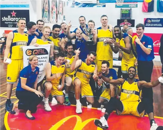  ?? HEATING UP: The Townsville Heat celebrate after being crowned QBL champions thanks to a 2- 1 series win over the Mackay Meteors. Picture: SUPPLIED ??