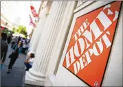  ?? MARK KAUZLARICH / BLOOMBERG ?? Home Depot increased its annual forecast, expecting this year’s revenue to gain 7 percent and seeing earnings at $9.42 a share.