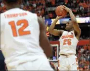  ?? ADRIAN KRAUS — THE ASSOCIATED PRESS ?? Syracuse guard Tyus Battle lines up a jump shot during the second half of an NCAA college basketball game in Syracuse, N.Y., Feb. 4. Syracuse beat Virginia 66-62.