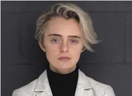  ?? AP ?? ‘DOING OK’: Michelle Carter, seen Monday in her booking photo, has been a ‘model inmate’ during her short stay at the Bristol County House of Correction, according to spokesman Jonathan Darling.