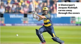  ??  ?? > Glamorgan’s Jacques Rudolph carves away through the covers