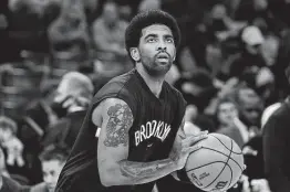  ?? Justin Ford / Getty Images ?? Kyrie Irving is scheduled to play his first game at the Barclays Center on Sunday after New York City announced its athlete vaccinatio­n exemption.