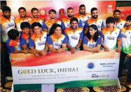  ??  ?? Asiad-bound Indian wrestlers pose at an event in New Delhi on Sunday.