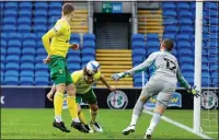  ??  ?? STOOP TO CONQUER: Grant Hanley scores for Norwich