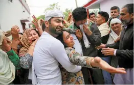  ?? — PTI ?? Relatives and family members mourn during Indian Army rifleman Varun Katal’s funeral at village Mawa in Samba, about 55km from Jammu, on Sunday. Kattal was killed on Saturday in a sniper fire during a ceasefire violation by Pakistan along the Line of Control in Sunderbani sector of Jammu and Kashmir.